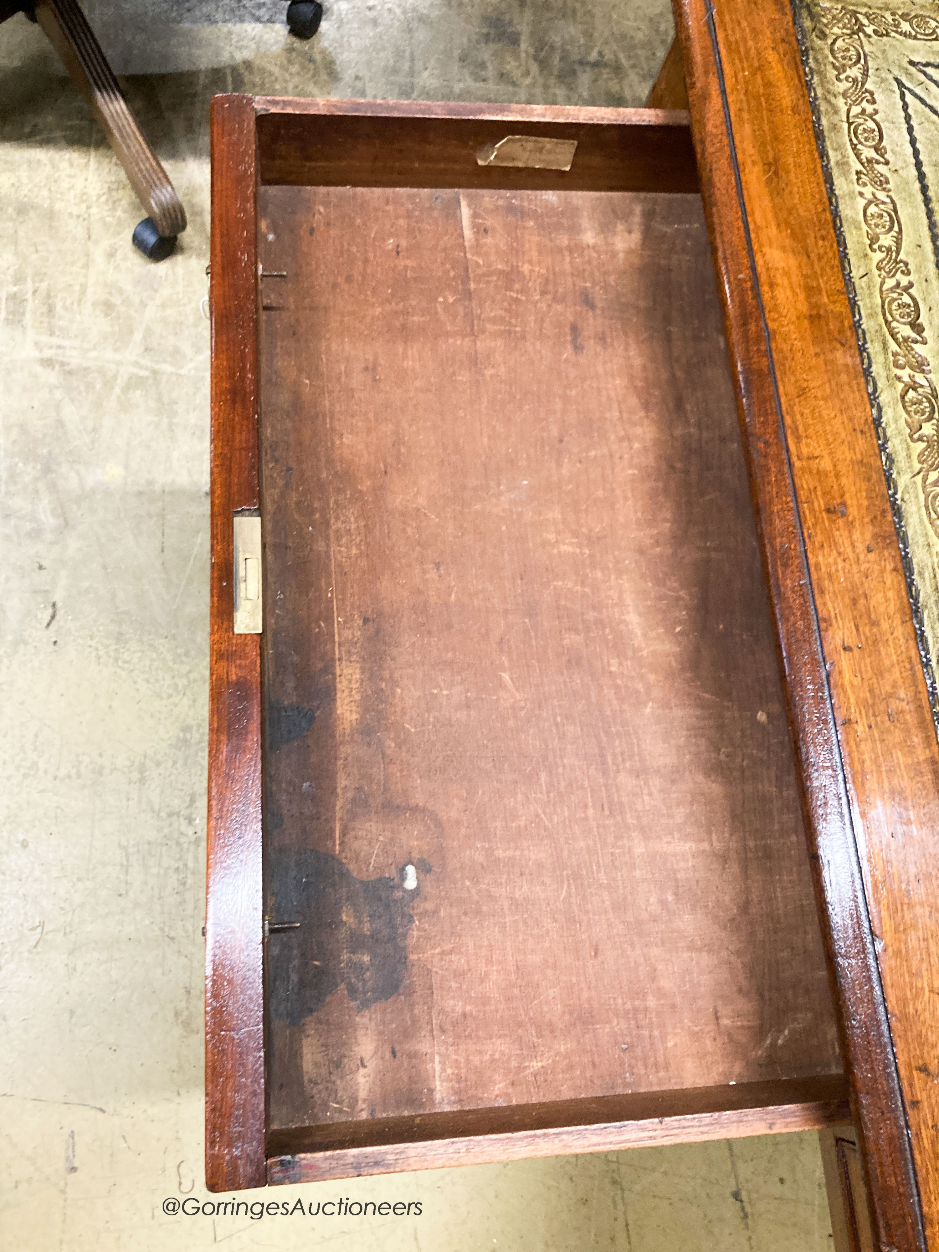 A Victorian mahogany partner's writing table, with green leather inset skiver, W.145cm D.112cm H.76cm